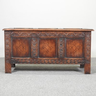 Lot 187 - An antique carved oak and inlaid coffer, with...