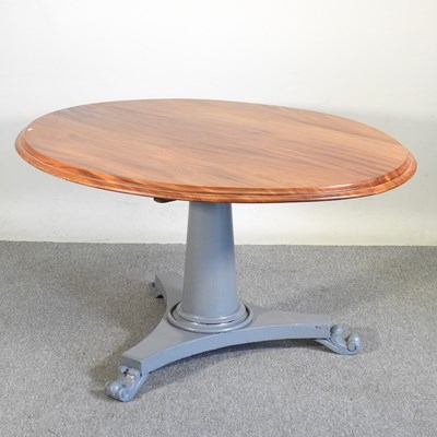 Lot 140 - A Victorian style oval dining table, on a grey...