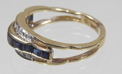Lot 20 - A 14 carat gold sapphire and diamond channel...