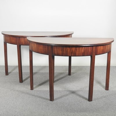Lot 100 - A pair of George III mahogany half-round side...