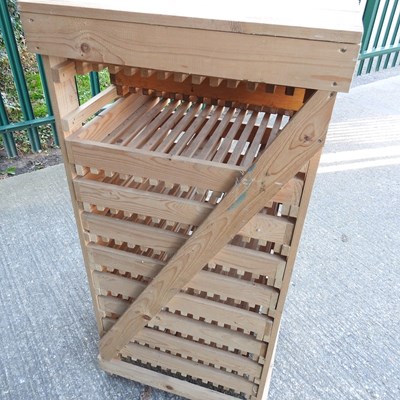 Lot 10 - A wooden fruit store, with ten pull-out drawers