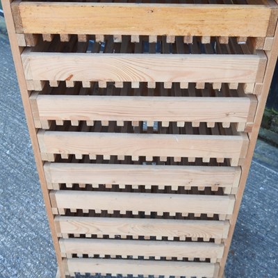 Lot 10 - A wooden fruit store, with ten pull-out drawers