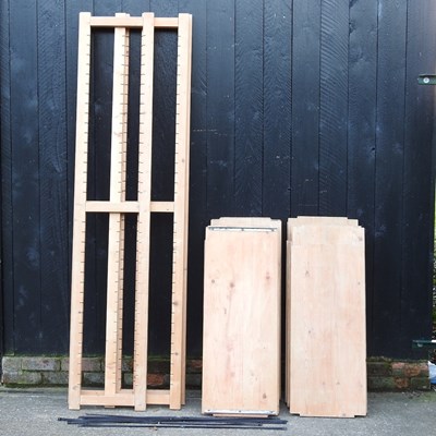 Lot 440 - A set of wooden adjustable shelves, in sections