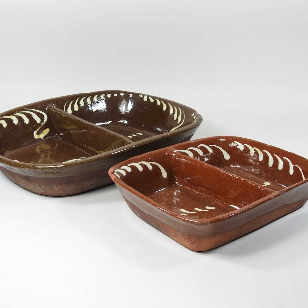 Lot 6 - A slipware baking tray, 39cm wide, together...
