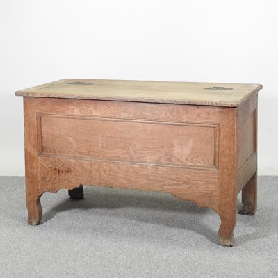 Lot 244 - An early 20th century continental oak coffer,...