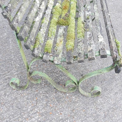 Lot 22 - A large wooden garden bench, on an iron base