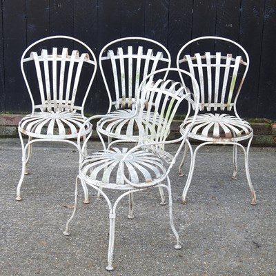 Lot 172 - A set of four cream painted metal garden...