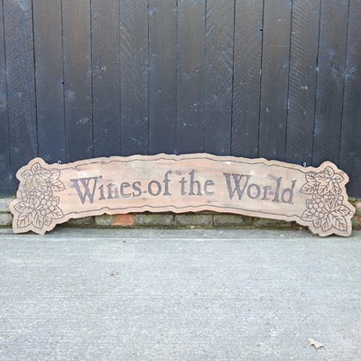 Lot 289 - A pokerwork wooden sign, inscribed Wines of...