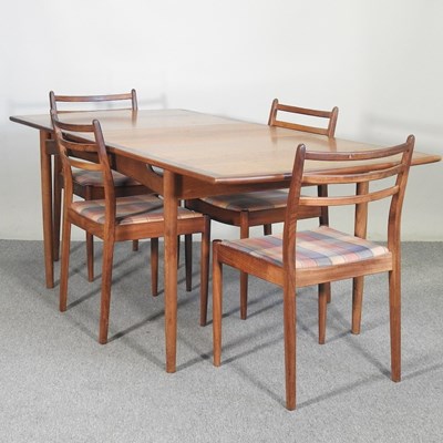 Lot 515 - A 1960's G Plan teak dining suite, comprising...