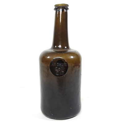 Lot 15 - An 18th century English brown glass sealed...