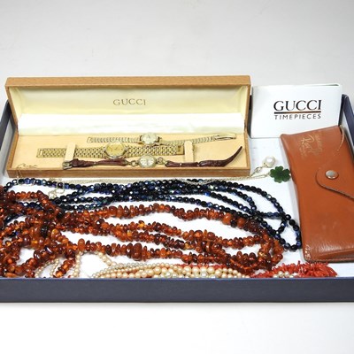 Lot 296 - A Gucci ladies gold plated dress watch, boxed,...