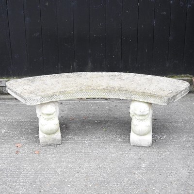 Lot 177 - A cast stone garden bench, on lion supports