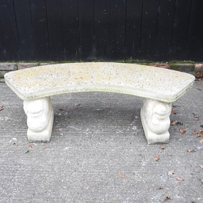 Lot 389 - A cast stone garden bench, on lion supports
