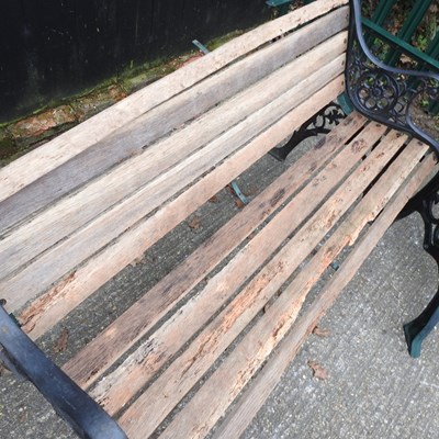 Lot 274 - A wooden garden bench, with green painted...