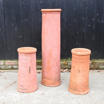 Lot 36 - A pair of terracotta chimney pots, together...