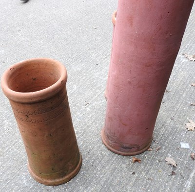 Lot 36 - A pair of terracotta chimney pots, together...