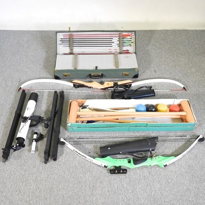 Lot 149 - A croquet set, together with an archery set,...