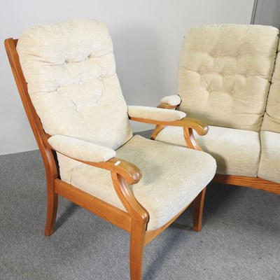 Lot 333 - A Cintique cream upholstered two seater sofa,...