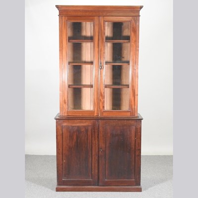 Lot 313 - A 19th century mahogany cabinet bookcase, on a...