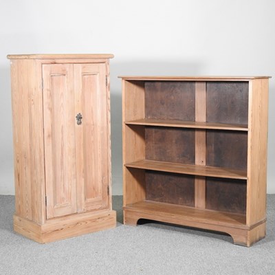 Lot 495 - An early 20th century pitch pine two door...