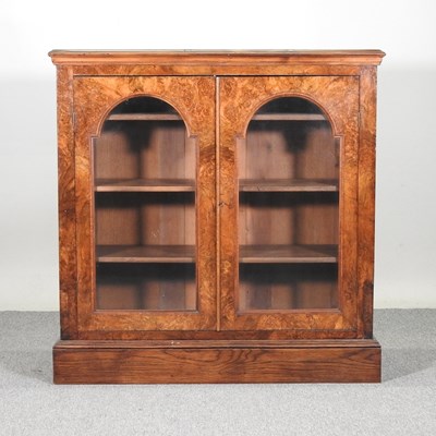 Lot 339 - An oak and walnut glazed dwarf bookcase, 19th...