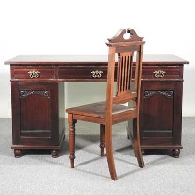 Lot 545 - An early 20th century twin pedestal desk,...