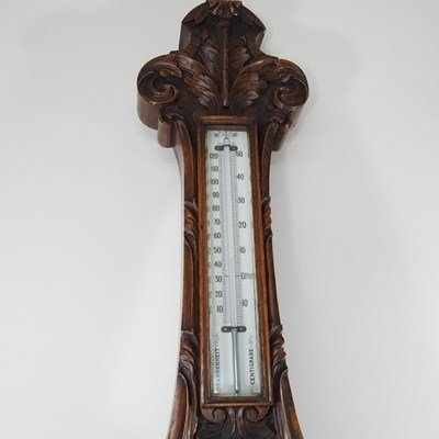 Lot 26 - A large Victorian carved oak cased aneroid...