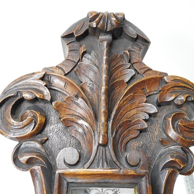 Lot 26 - A large Victorian carved oak cased aneroid...