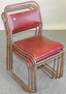 Lot 430 - A set of four metal stacking chairs