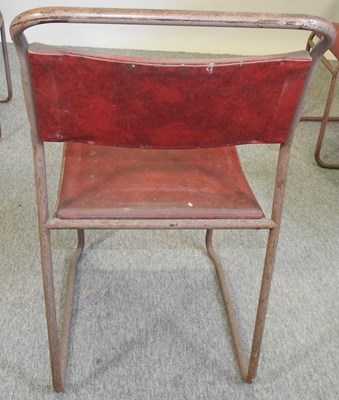 Lot 430 - A set of four metal stacking chairs