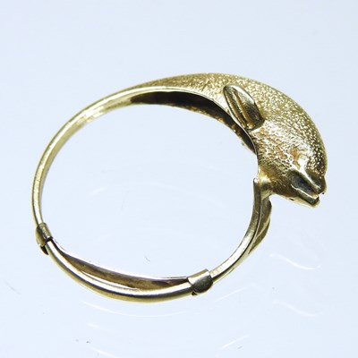 Lot 236 - A 14 carat gold ring, in the form of a dolphin,...