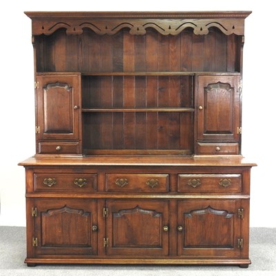 Lot 211 - An 18th century style oak dresser, 20th...