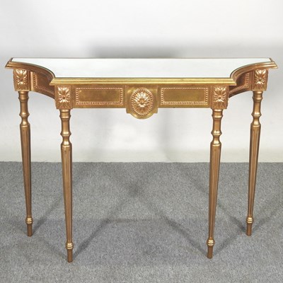 Lot 231 - A modern gilt painted pier table, with a...