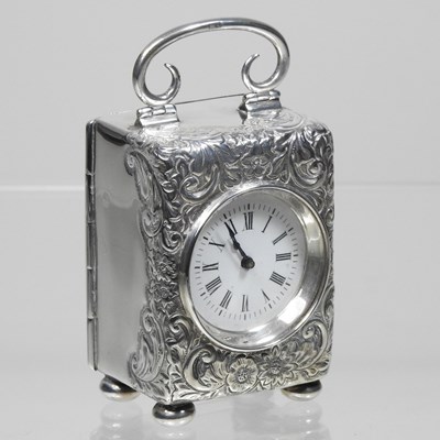 Lot 116 - A Victorian silver cased boudoir clock, having...