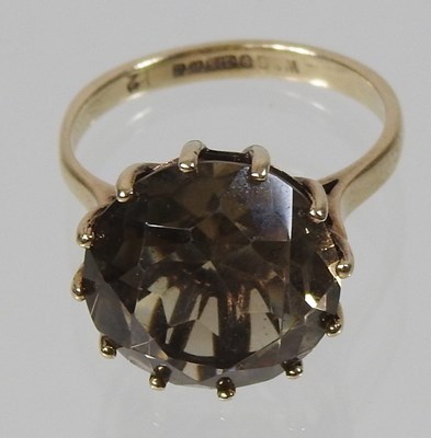 Lot 71 - A 9 carat gold smoky quartz single stone ring