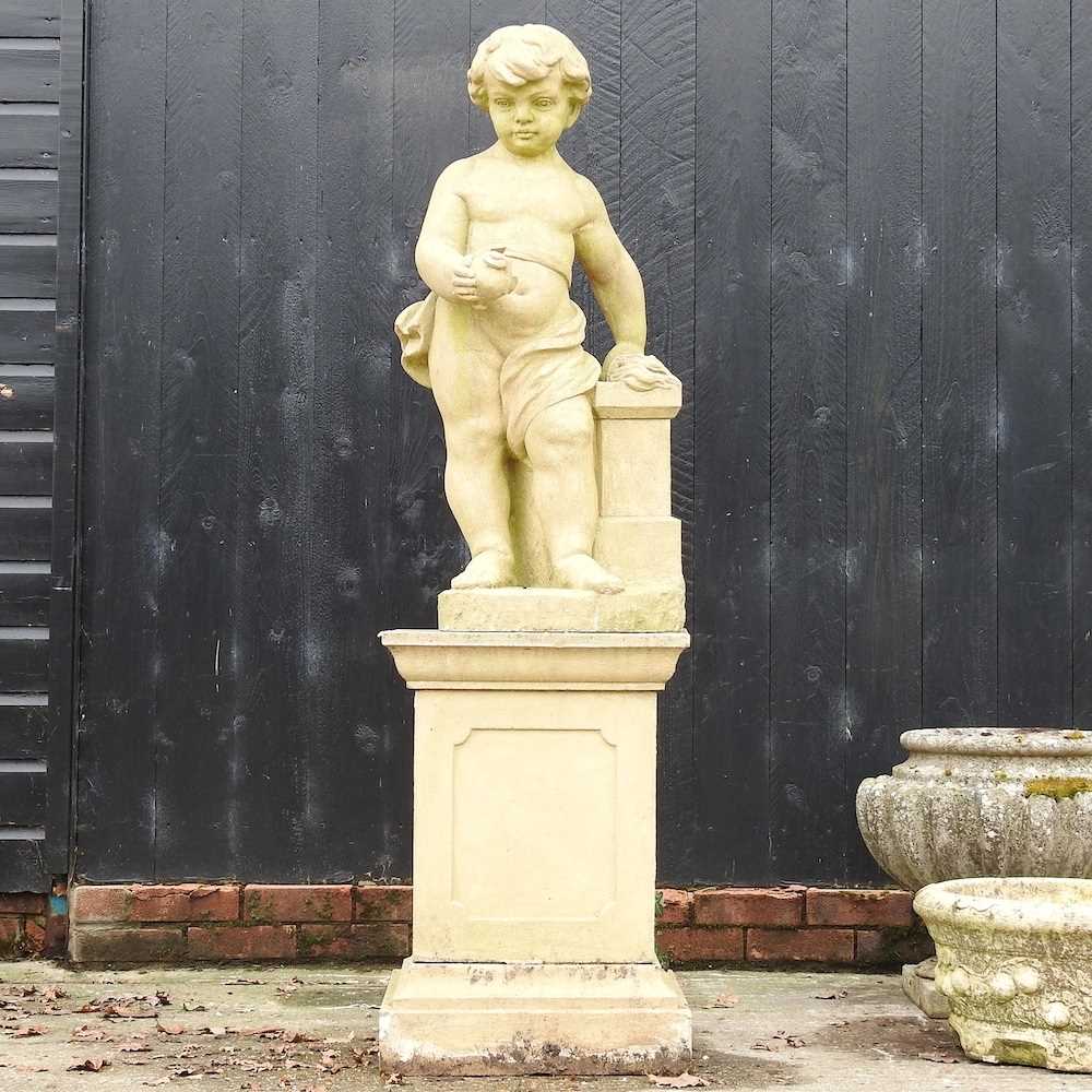 Lot 1 - A cast stone garden statue figure of a cherub,...