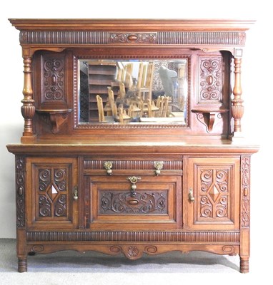 Lot 332 - A good quality early 20th century oak mirror...