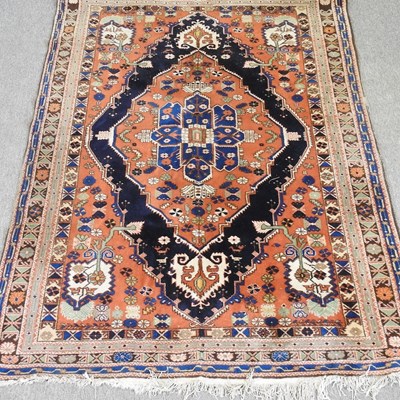Lot 151 - A Persian rug, with a large central medallion,...
