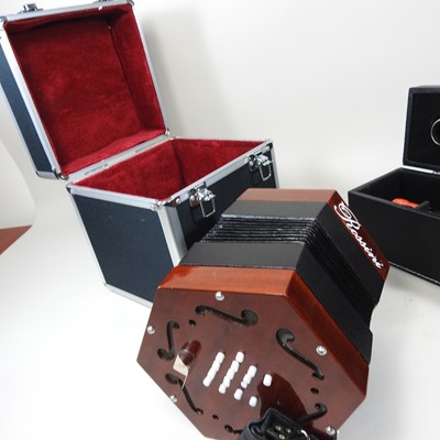Lot 35 - A Rossini concertina, cased, together with a...