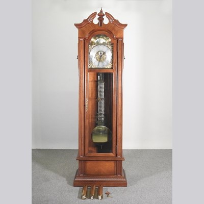 Lot 861 - A modern teak cased longcase clock, the brass...