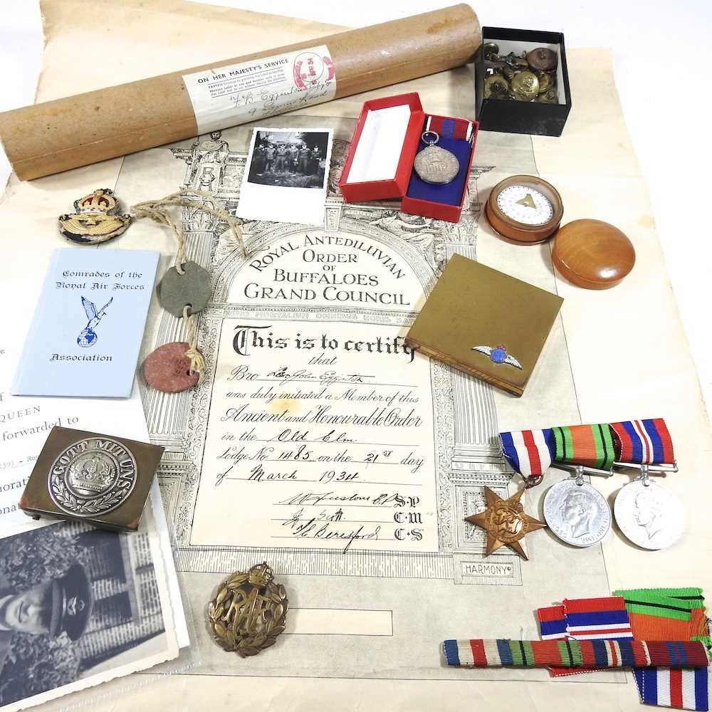 Lot 6 - A group of three World War II medals, together...