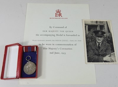 Lot 6 - A group of three World War II medals, together...
