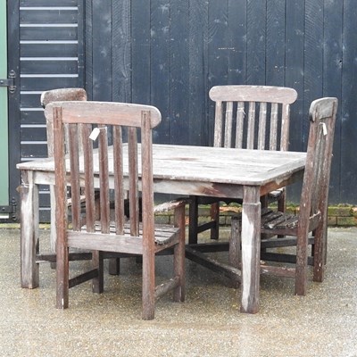 Lot 232 - A hardwood garden table, together with a set...