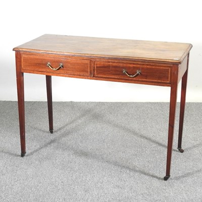 Lot 229 - An Edwardian mahogany side table, containing...