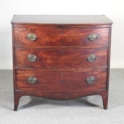 Lot 398 - A 19th century mahogany bow front chest,...