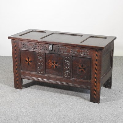 Lot 273 - An 18th century oak and inlaid coffer, with a...