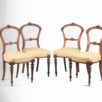 Lot 364 - A set of four Victorian walnut dining chairs