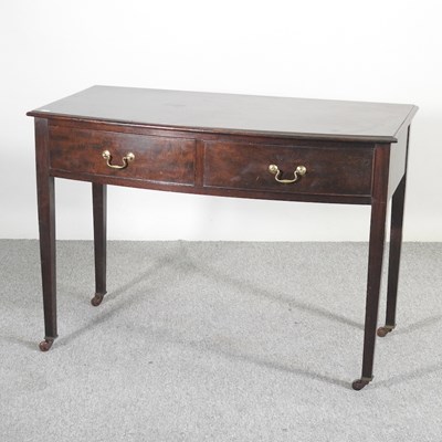 Lot 309 - A 19th century mahogany bow front side table,...