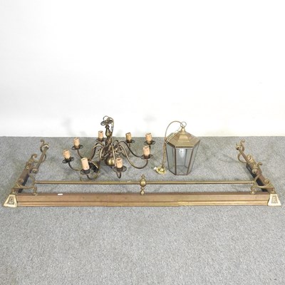 Lot 127 - A 19th century brass fender, together with an...
