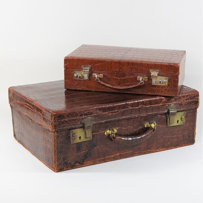 Lot 370 - An early 20th century crocodile skin travelling case
